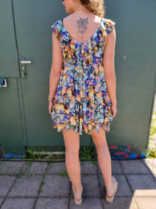 Fleurige jurk met franjes | S